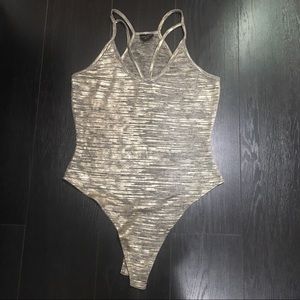 Free press bodysuit in gold